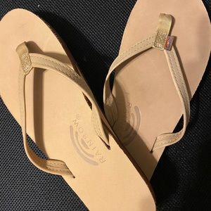 Women’s rainbow flip flops